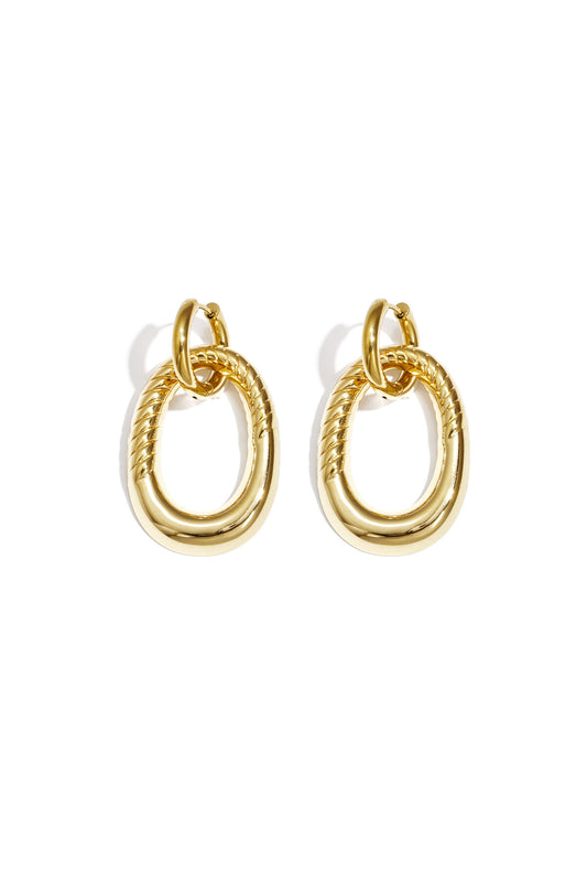 Statement oorbellen met gedetailleerde ovale hanger