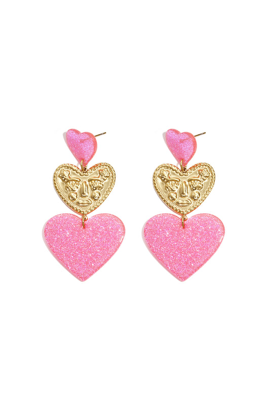 Statement oorbellen met glitter harten
