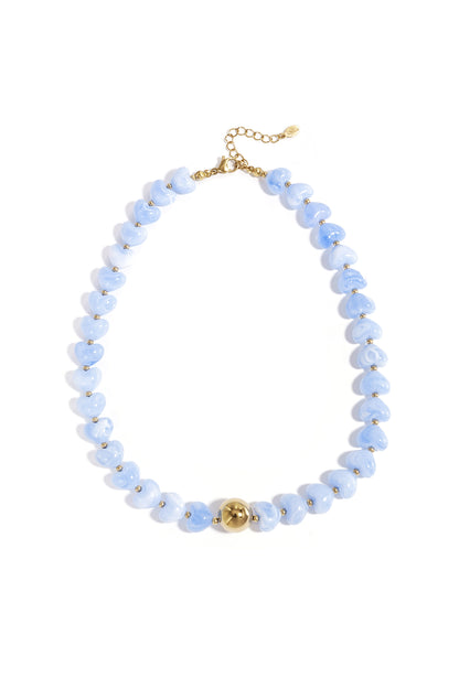 Ketting met statement en hartvormige kralen
