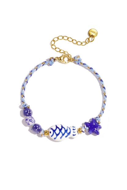 Kralenarmband met touwmotief, vis en ster kralen